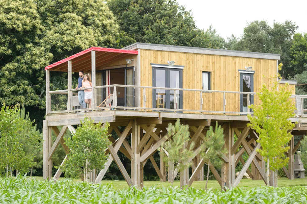 Chalet Cottage sobre pilotes PREMIUM  (2 habitaciones) + terraza cubierta