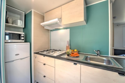 Mobil-home Confort 35m² 3 chambres + terrasse semi-couverte + TV + lave-vaisselle