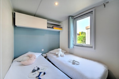 Mobil-home Confort 35m² 3 chambres + terrasse semi-couverte + TV + lave-vaisselle