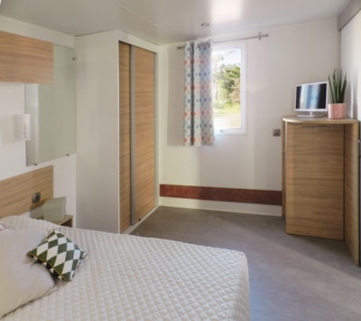 Mobile home CONFORT 2 bedrooms  34m² sheltered terrace adapted to the people with reduced mobility