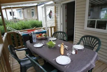 Mietunterkunft - Mobilheim 'Evasion Confort Eco' 29M² + 2 Zimmer + Terrasse Teilweise Überdacht 13.5M² - Camping L'Eden