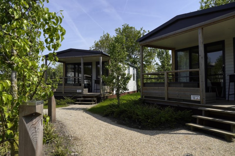 Hütte Living (3 Erwachsene - 1 Kind)