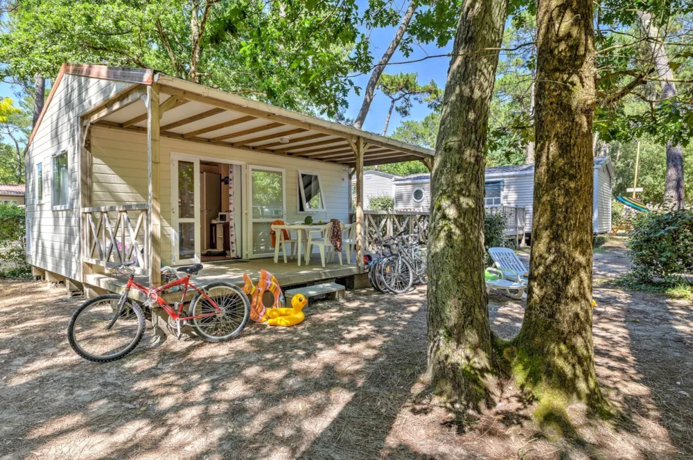 Location - Chalet 2Ch (Sans Tv) | Standard - 24M² - Terrasse Couverte - Flower Camping Les Biches