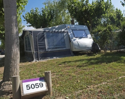 Pitch Medium Standard (<90m² car + tent / caravan / camping-car + electricity 10A + water) — 2