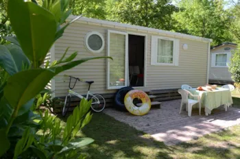 Mietunterkunft - Mobilheim Standard 28M² 2 Zimmer + Terrasse - Flower Camping PEYRELADE