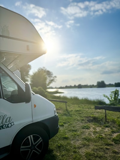 Pitch camping car by the river — 1