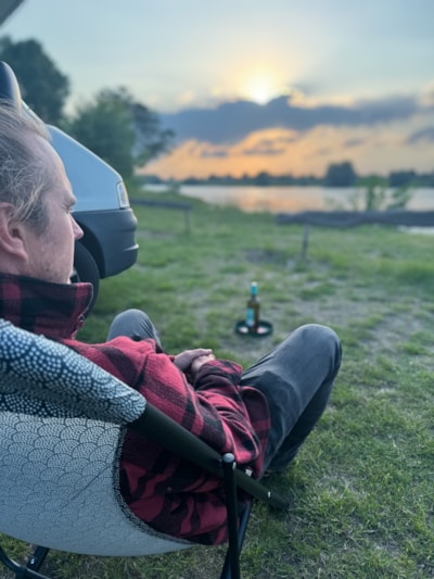 Pitch camping car by the river — 2