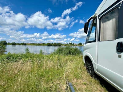 Pitch camping car by the river — 4