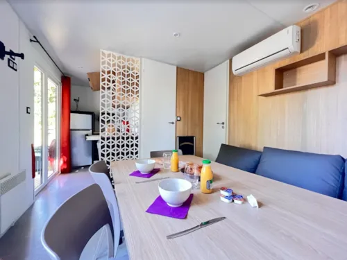 Location - Cottage Loggia - image n°3 - Camping La Grappe Fleurie