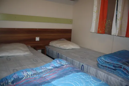 Mietunterkunft - Mobilheim Confort Mit Gedeckte Terrasse (27.50 M²) - image n°3 - Camping Des 3 Lacs