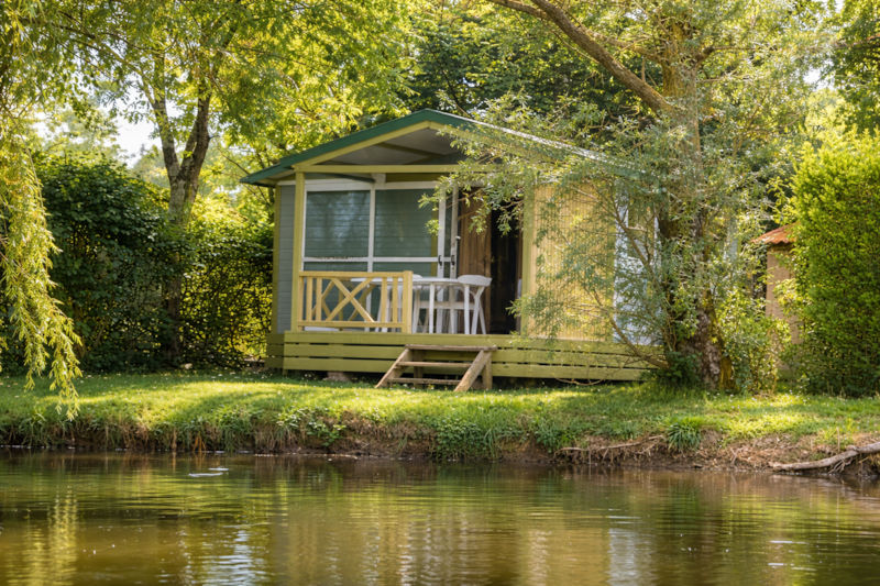 Wooden lakeside chalet with terrace