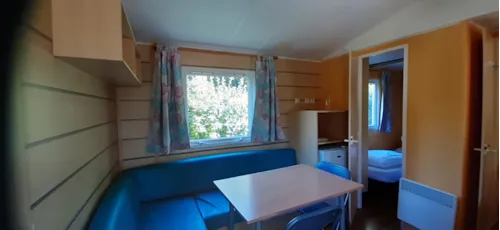 Accommodation - Mobile Home + Half-Covered Terrace - image n°4 - Camping Le Moulin