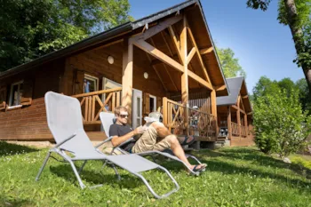 Mietunterkunft - Holzchalet 3 Schlafzimmer Tv Lv Überdachte Terrasse - Sites et Paysages Pyrénévasion