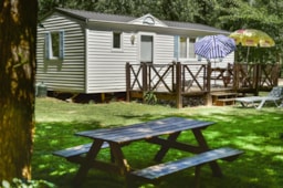 Camping LA RIVIERE - image n°31 - Roulottes